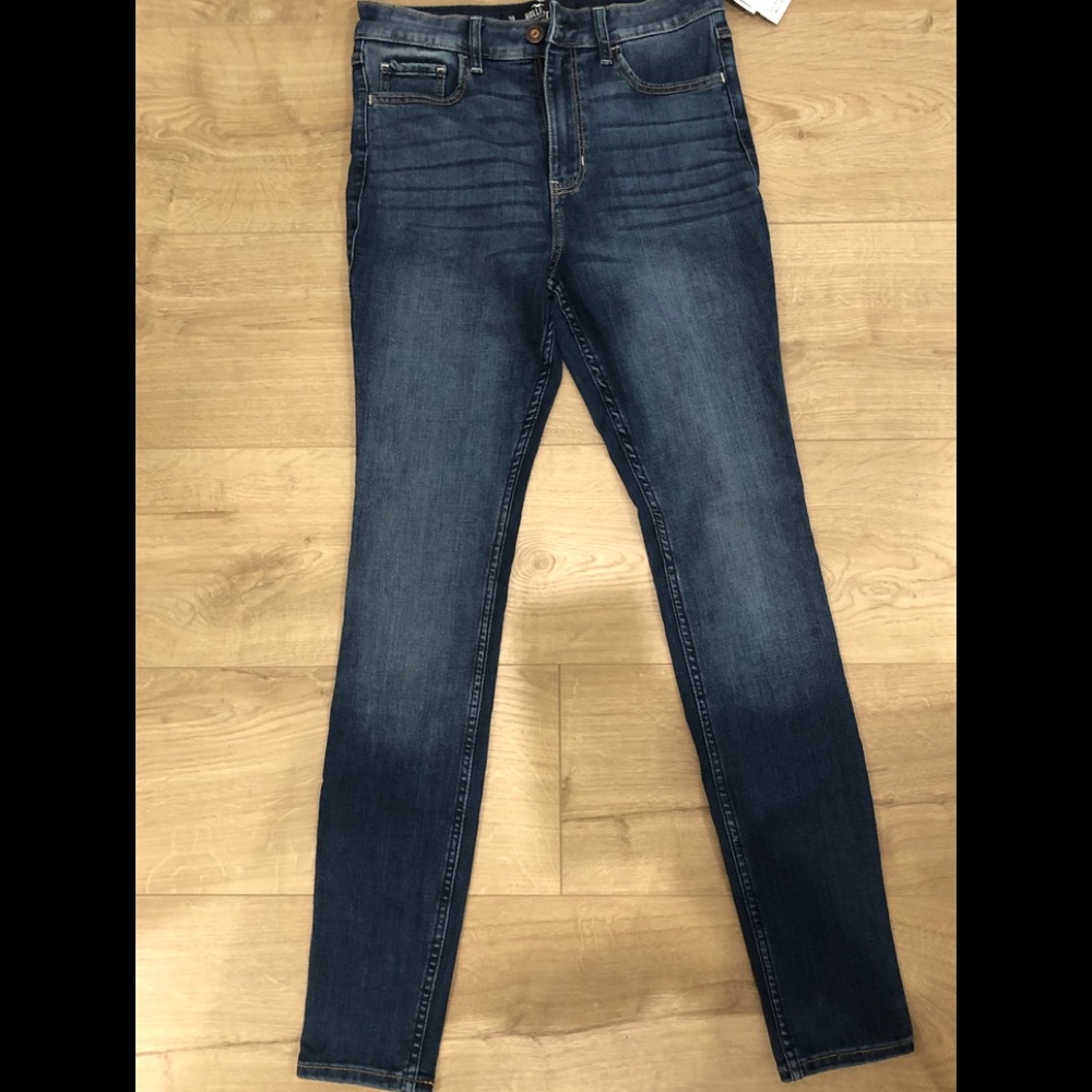 Dark blue with lighter wash at knee area and butt